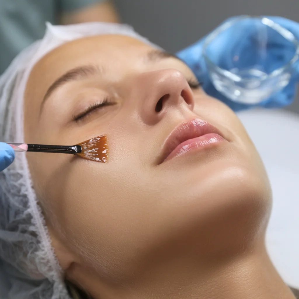 A women getting a medspa facial with a hairnet on